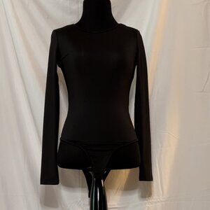 Women’s black, long-sleeved, body suite.